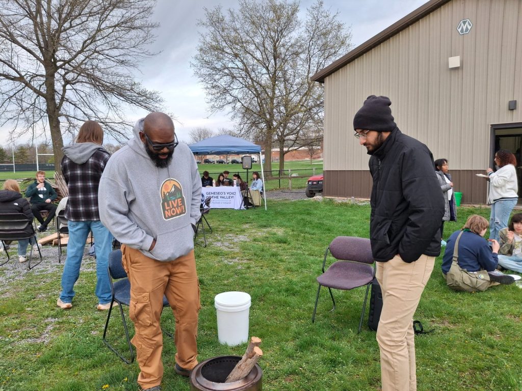 Multicultural Affairs Director Clifton Harcum and assistant Boz - 2026 Earth Day Celebration