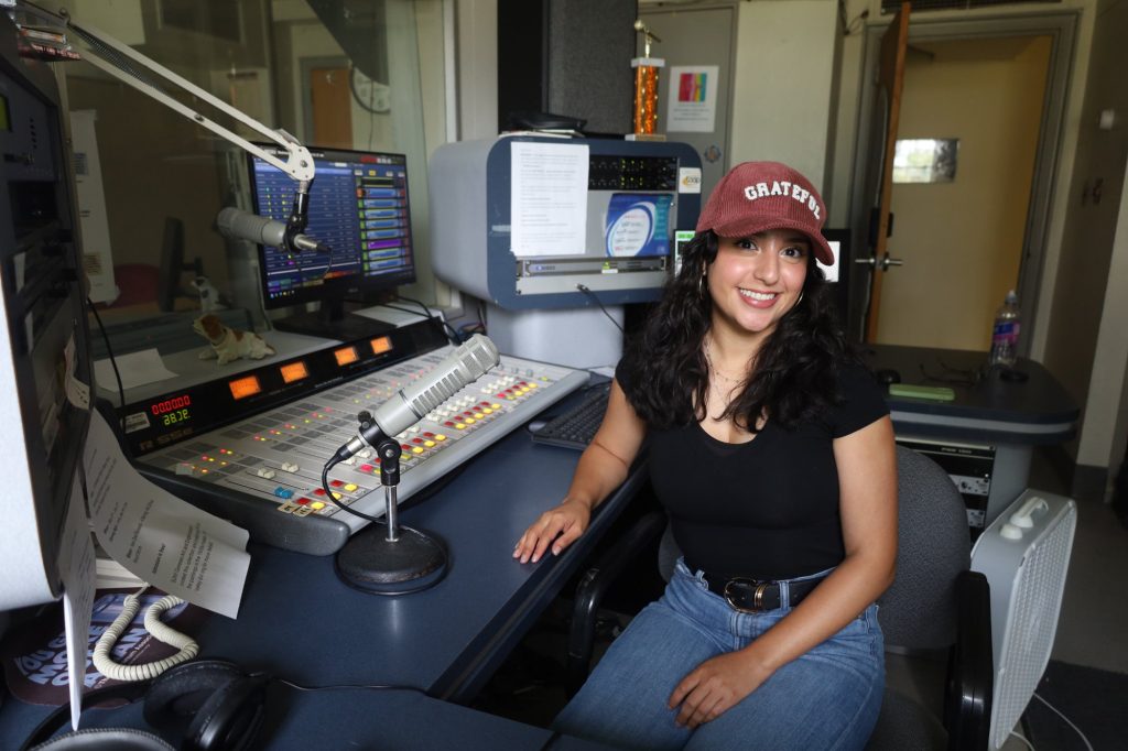 WGSU alumna Rocio Ruiz, SUNY Geneseo Class of 2023, at the WGSU console