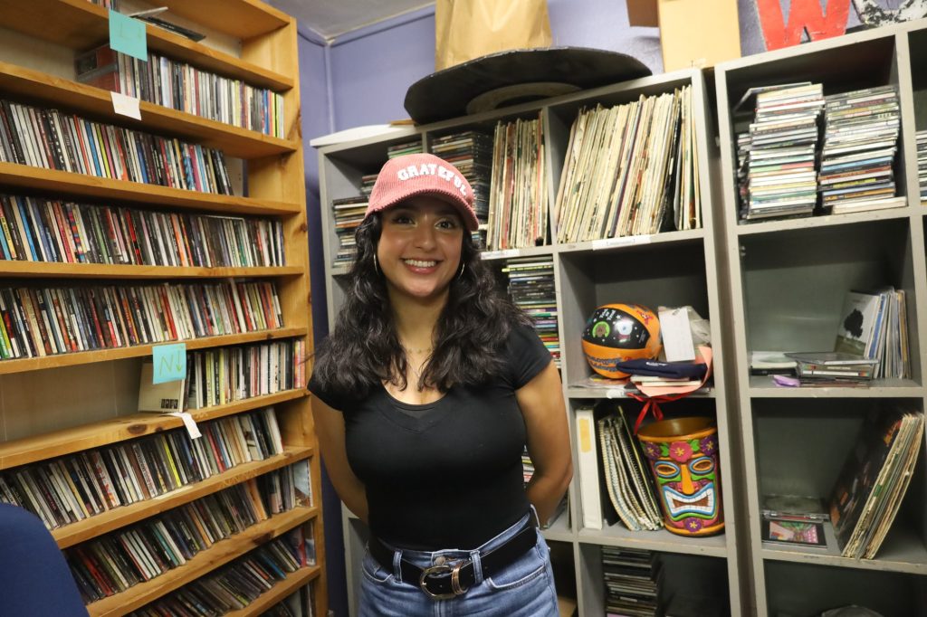 WGSU alumna Rocio Ruiz, Class of 2023, inside the Music and Promotions office