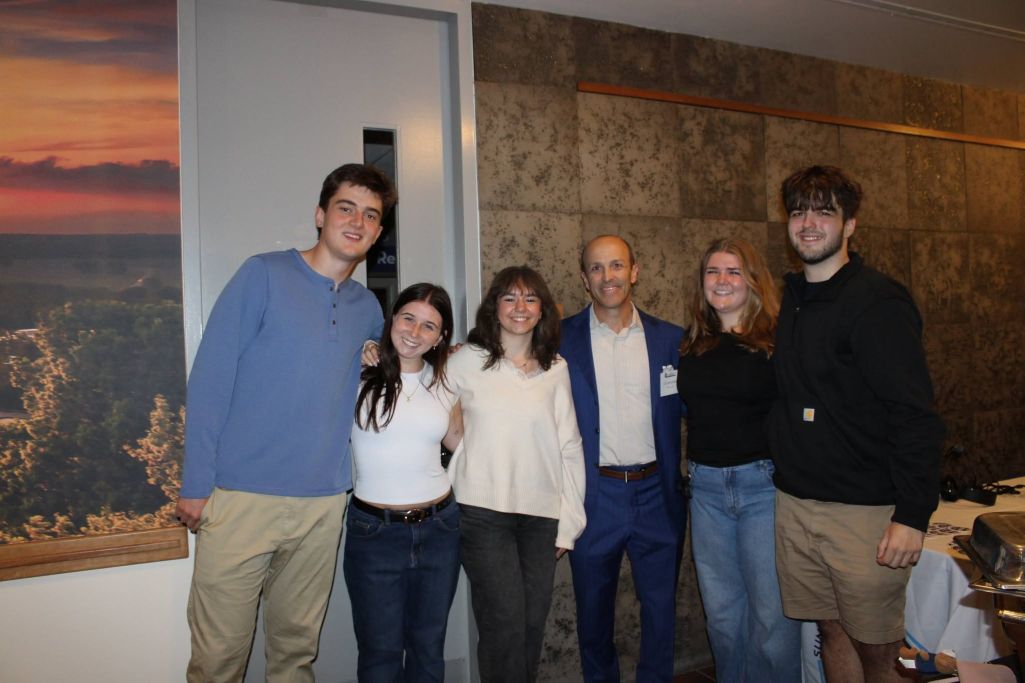 WGSU staff members with WGSU alumnus Chris Brown '94